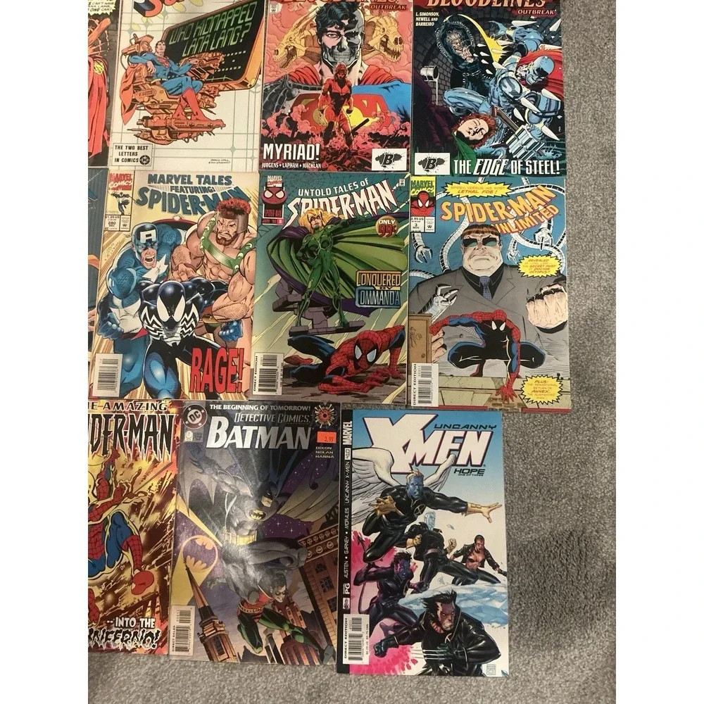 Vintage 15 lot of superhero comic books from both DC and Marvel publishers.